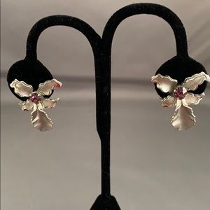 Signs Bugbee and Nikes costume jewelry earrings.